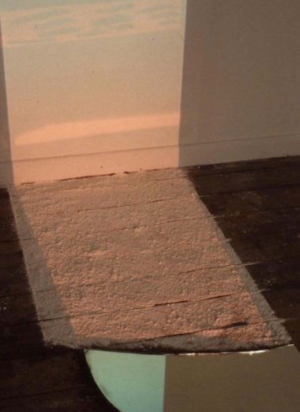 Water Course i detail 1993  glass mirror paint plaster dust projected slide installation by Jane Boyd 